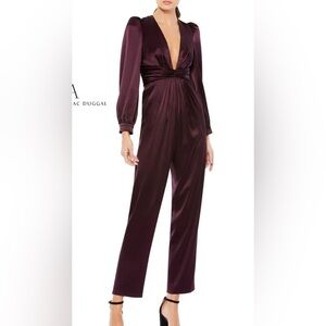 Plum colored jumpsuit from Mac duggal originally $300
Never worn
NWT